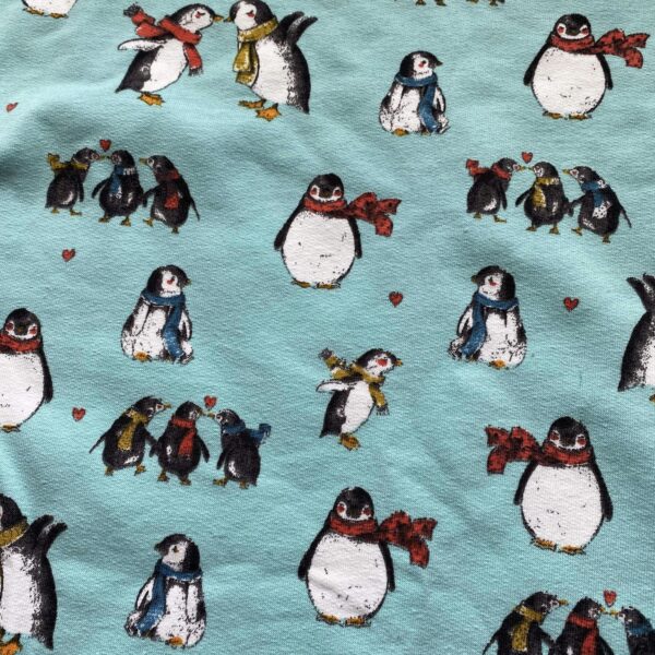 Turquoise Fabric with penguins