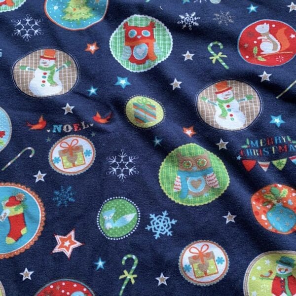 Navy blue fabric with festive circle design
