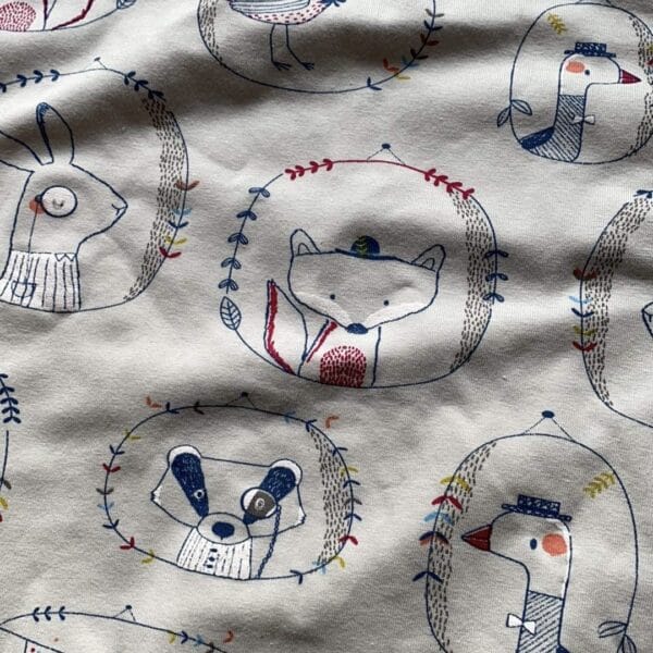 grey fabric with animals